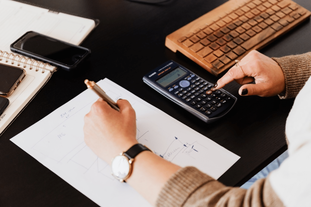 An accountant using a calculator.