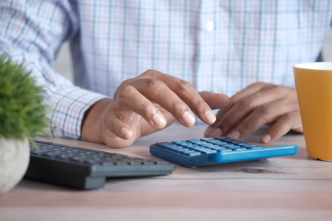 An accountant calculating profit